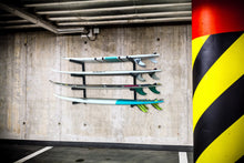 Load image into Gallery viewer, Wall mounted onto garage surfboard racks powder coated black to hold 4 surfboards or mal 
