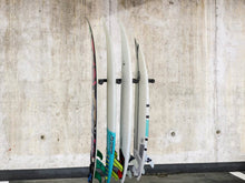 Load image into Gallery viewer, Wall mounted garage vertical surfboard racks powder coated black to hold 4 boards