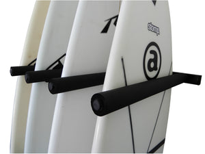 Wall mounted vertical surfboard racks powder coated black to hold 4 boards